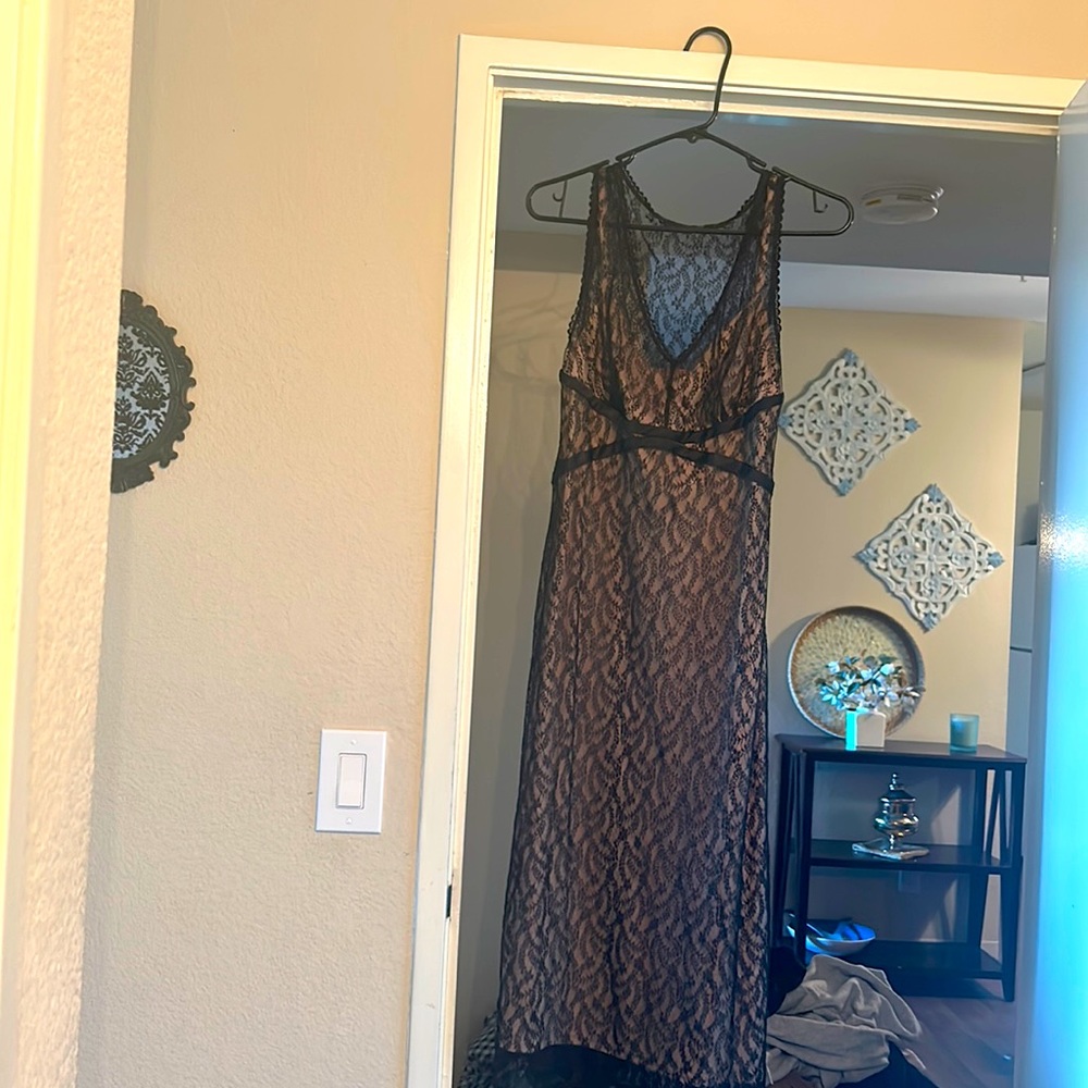 Black lace knee length sleeveless dress